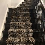 Striking leopard print stair runner over dark hardwood staircase | Bon Air, VA